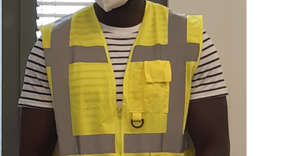 an employee wearing his post-covid equipment